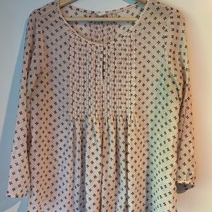 Women’s baby doll polka dot blouse.